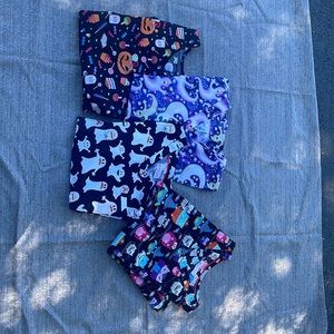 Halloween scrub bundle. 4 scrub tops all size medium.